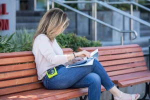 woman using Mobile ECG Device